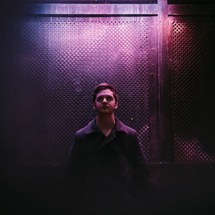 Musician James Or promo shot in dark room
