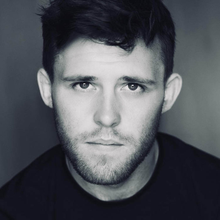 Niall McNamee black and white moody headshot